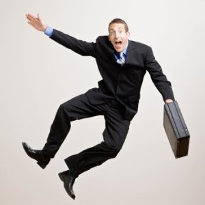 business man jumps in the air